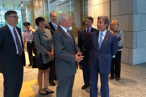 Photo 3 - Pence and Nakasone Hand Shake